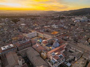 High angle view of townscape against sky during sunset