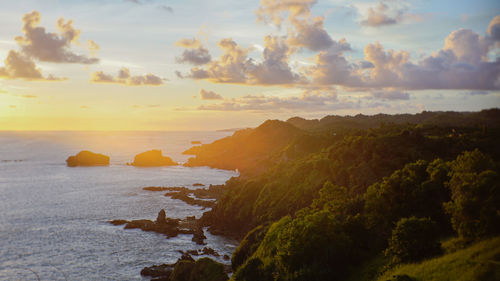 Scenic view of sea against sky during sunset