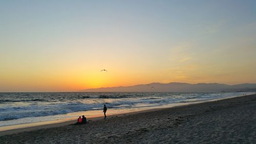 Scenic view of sea at sunset
