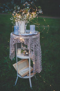 Empty coffee cup on table with book