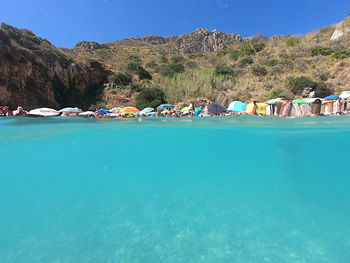 Scenic view of sea against clear blue sky