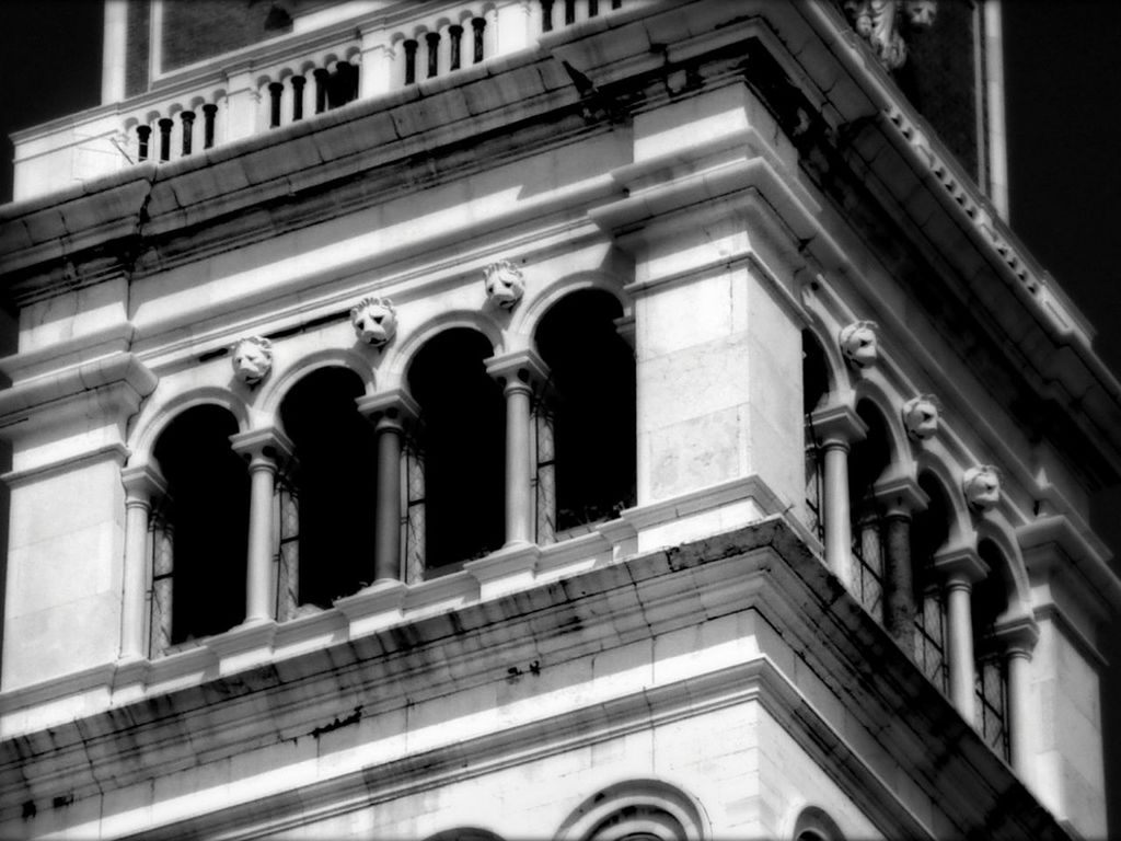 architecture, built structure, building exterior, low angle view, arch, history, facade, architectural column, building, window, city, travel destinations, church, religion, historic, famous place, place of worship, outdoors, old