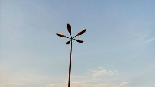 Low angle view of street light against sky