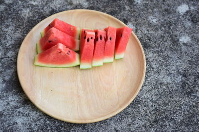 High angle view of chopped slices on cutting board