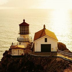 Scenic view of sea at sunset