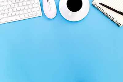 High angle view of coffee cup on table