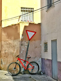 Bicycle parked outside building