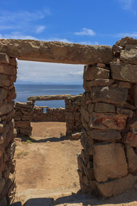 Stack of stone structure against sky