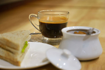 Close-up of coffee served on table