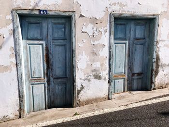 Closed door of abandoned house