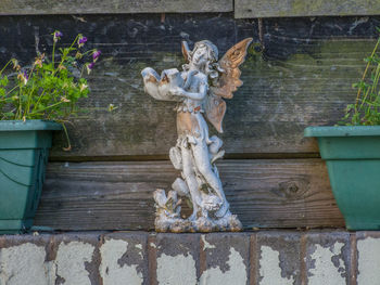 Low angle view of stone wall