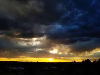 Scenic view of dramatic sky during sunset