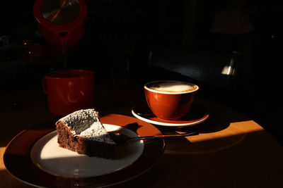 Close-up of coffee cup on table