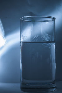 Close-up of water glass on table