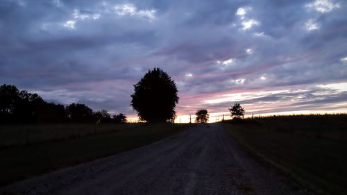 Road passing through field