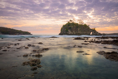 Scenic view of sea against sky during sunset