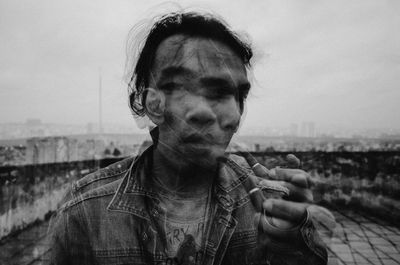 Portrait of man against sky