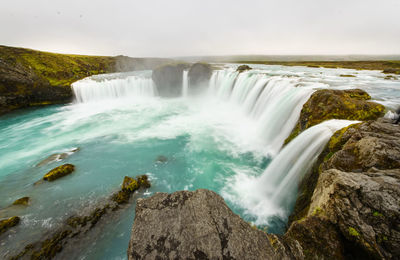 View of waterfall against sky