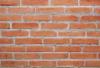 Full frame shot of red brick wall