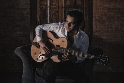 Young man playing guitar