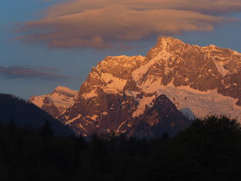 Scenic view of mountains against sky during winter