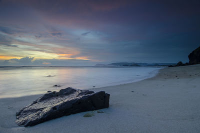 Scenic view of sea against sky at sunset