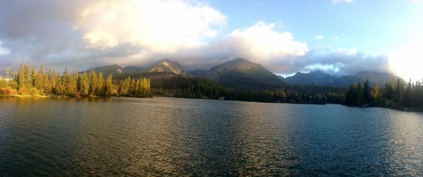 Scenic view of lake with mountains in background