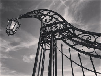 Low angle view of rollercoaster against sky