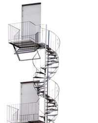 Low angle view of spiral stairs on building 