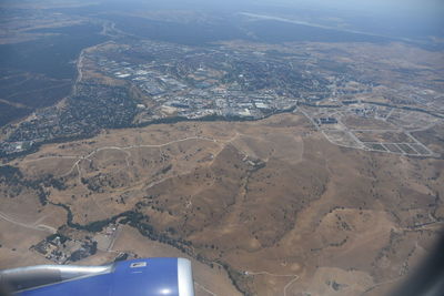 Aerial view of landscape with mountains in background
