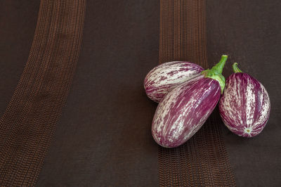 High angle view of purple candies on table