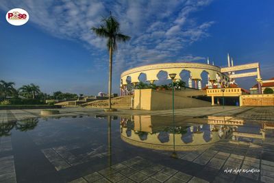 View of swimming pool against cloudy sky