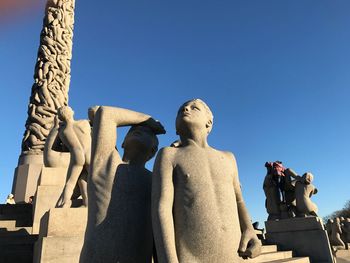 Low angle view of statue against clear sky