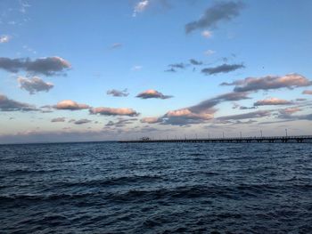 Scenic view of sea against sky at sunset