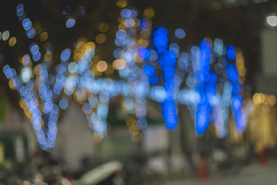 Close-up of illuminated christmas lights at night