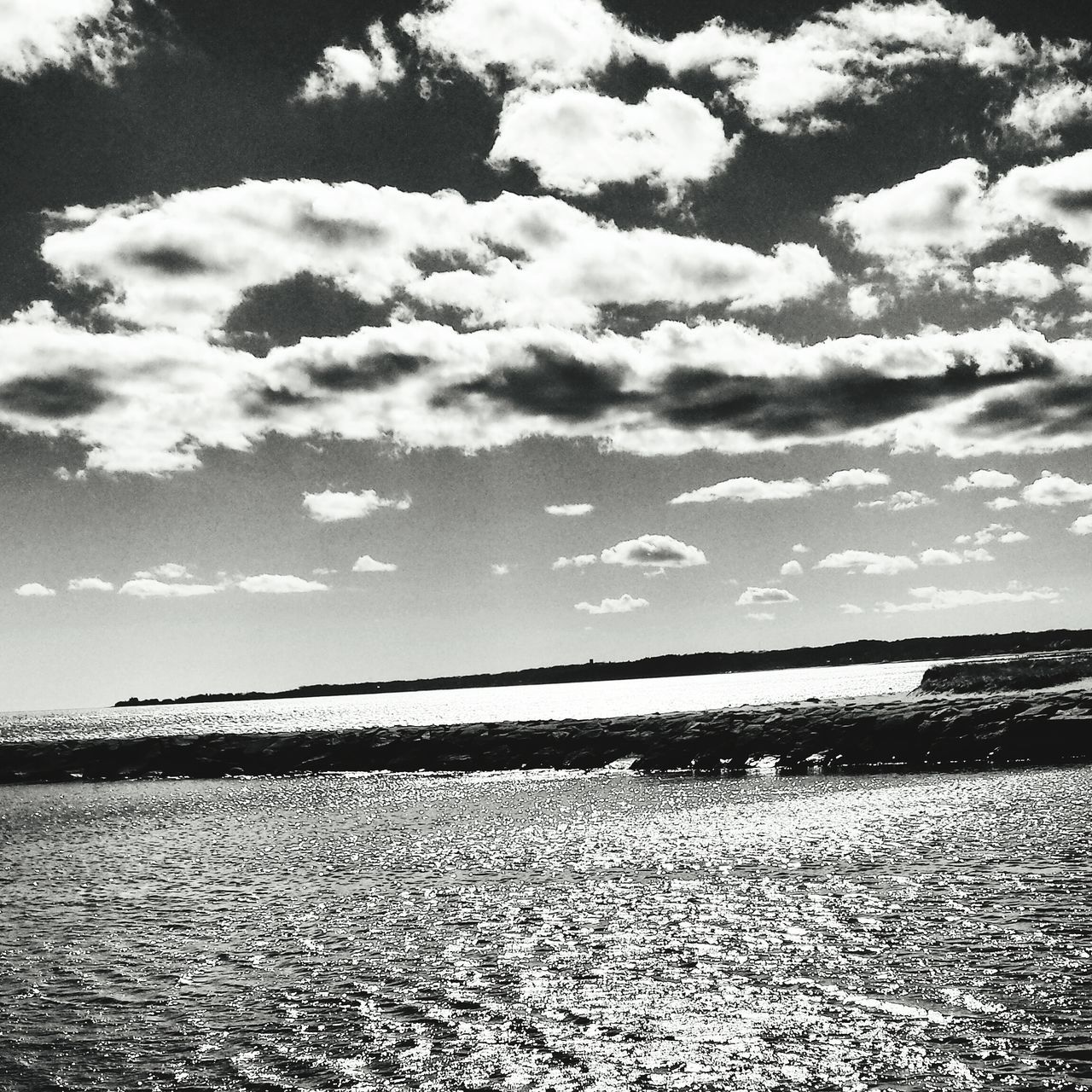 water, sky, tranquil scene, cloud - sky, tranquility, sea, scenics, beauty in nature, cloud, nature, cloudy, beach, shore, idyllic, rippled, lake, outdoors, day, calm, no people