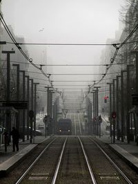 Railroad tracks on railroad station platform