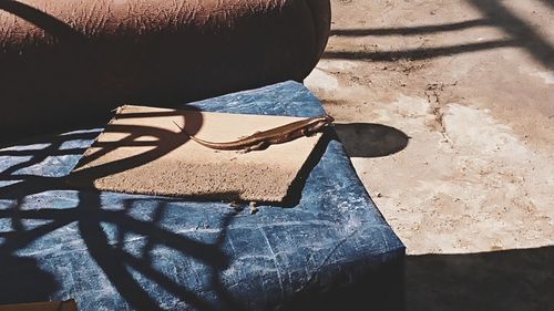 High angle view of man wearing sunglasses standing outdoors