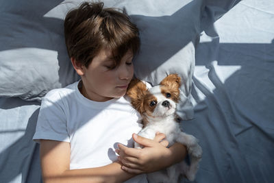 Portrait of boy with dog