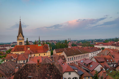 Aerial view of townscape against sky