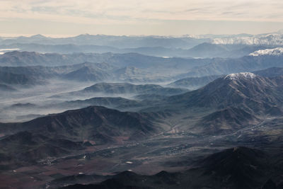 Scenic view of mountains against sky during sunset