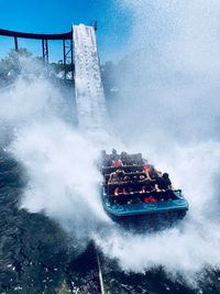 Water splashing on boat in sea