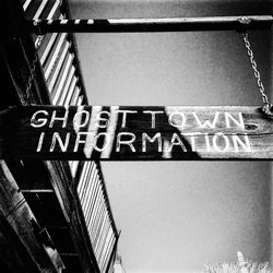 Low angle view of text on wall