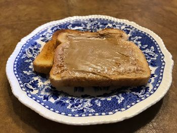 Close-up of bread in plate on table