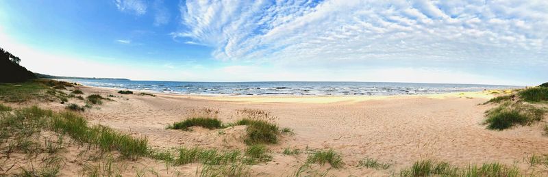 Scenic view of beach against sky