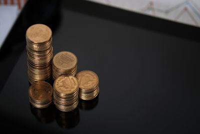 High angle view of coins on table