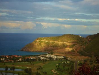 Scenic view of sea against cloudy sky