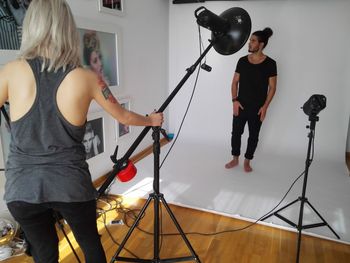 Full length of a man photographing