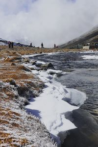 Frozen mountain stream and alpine valley at zero point, popular tourist destination in sikkim, india