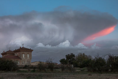 Storm clouds over landscape